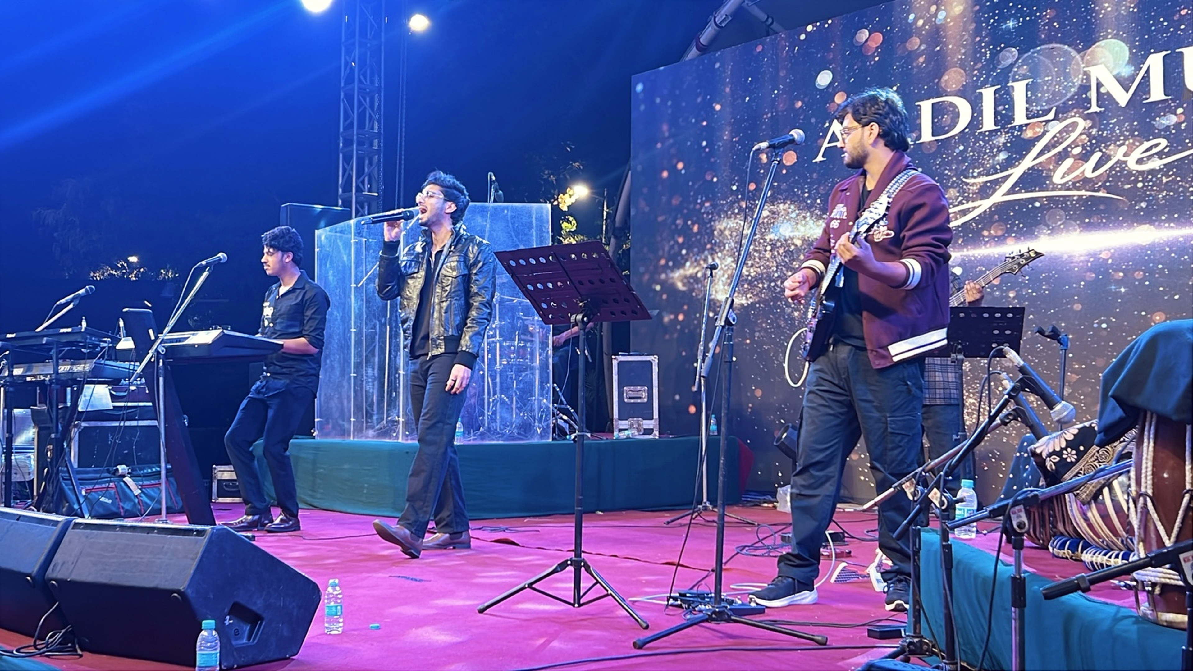 AADIL performing live on stage